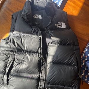 The north face black puffer vest size m